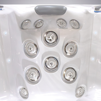 Radiating waves of energy coming from jets on a hot tub.