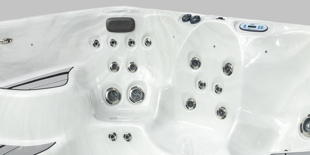 Jets, Nonslip Comfort Floor system, and control panel in a swim spa.