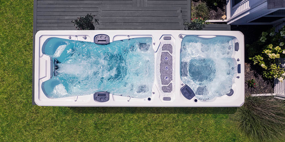 Drone view directly above a swim spa with propulsion turned on.